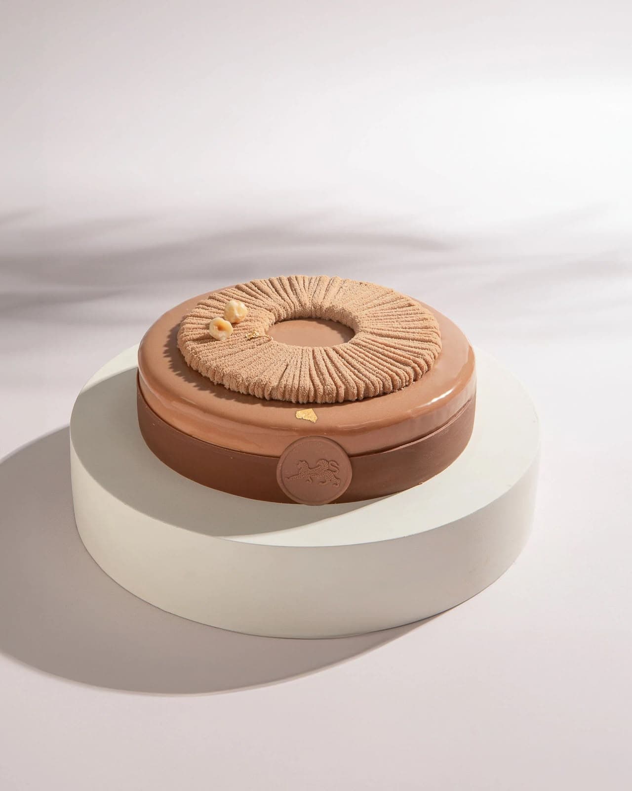 Hazelnut Cake on a white stand